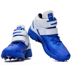 A pair of blue, and white cricket bowling shoes with metal spikes and an external strap for support.