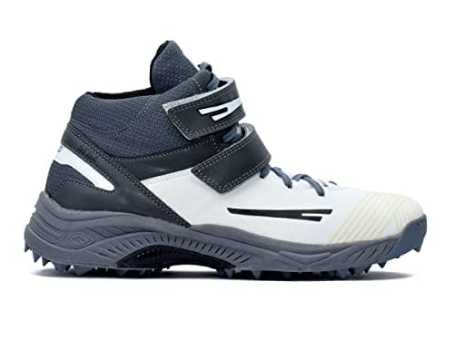 A pair of white, and grey cricket bowling shoes with rubber studs and an external strap for support.