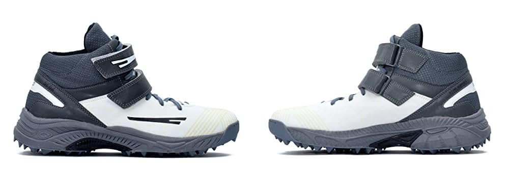 A pair of white, and grey cricket bowling shoes with rubber studs and an external strap for support.