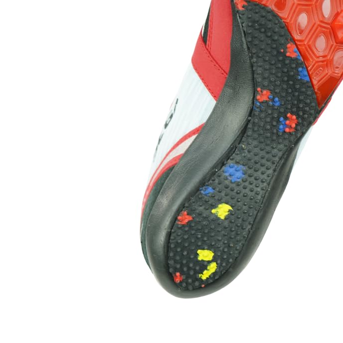 A pair of Sega Endurance metal running spikes for track and field, featuring a white and red color scheme with black accents, and detachable spikes on the sole.