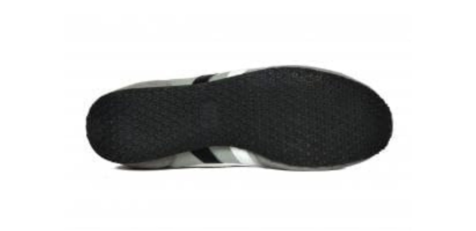 A pair of gray SEGA suede leather sneakers with lace-up closure.