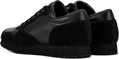 A pair of black semi-formal lace-up fashion shoes made of premium suede leather, with a rubber sole.