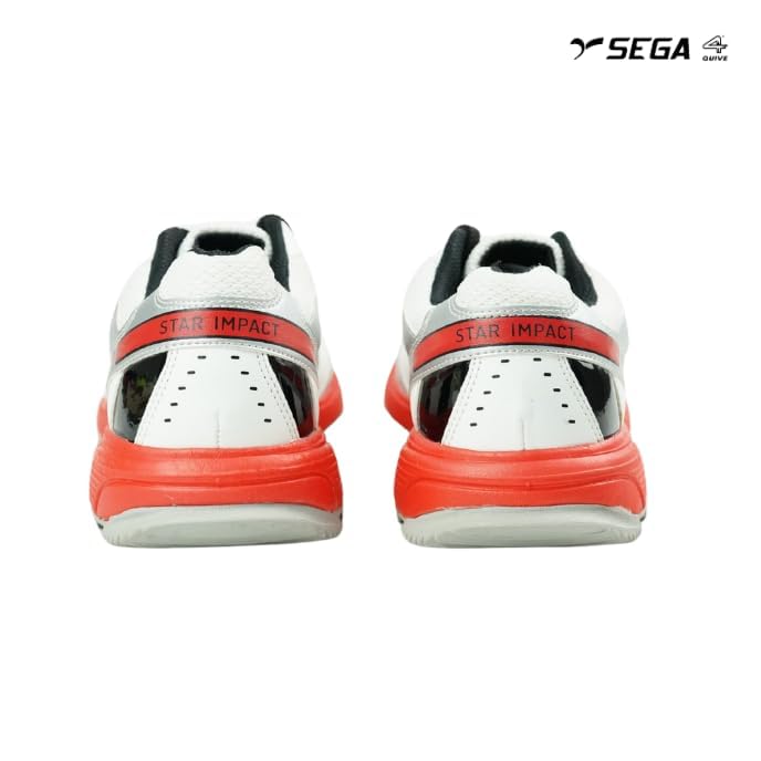 A pair of white cricket shoes with red accents and a distinctive design on the sole.