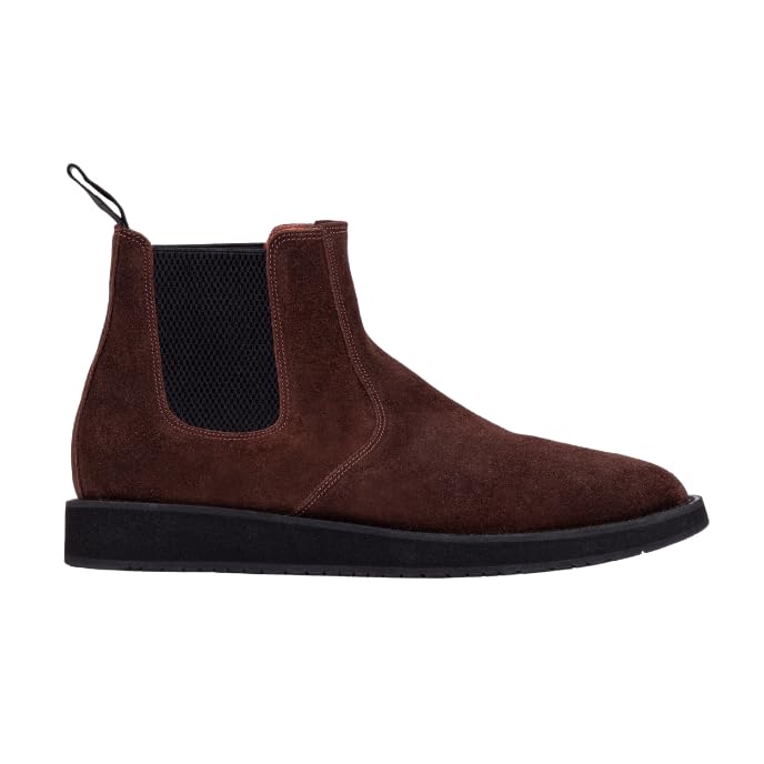 A pair of brown leather Chelsea boots with a rubber sole.