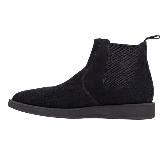 A pair of black leather Chelsea boots with a rubber sole.