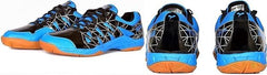 A pair of SEGA LOTUS badminton tennis and squash court shoes with a black and blue design and orange accents.