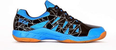 A pair of SEGA LOTUS badminton tennis and squash court shoes with a black and blue design and orange accents.