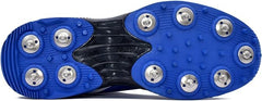 A pair of blue, and white cricket bowling shoes with metal spikes and an external strap for support.
