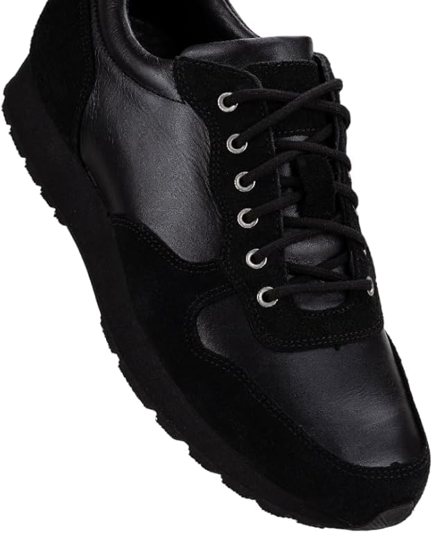 A pair of black semi-formal lace-up fashion shoes made of premium suede leather, with a rubber sole.
