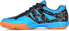 A pair of SEGA LOTUS badminton tennis and squash court shoes with a black and blue design and orange accents.