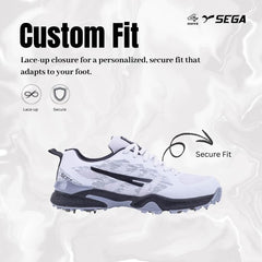 A pair of Sega Freedom men's cricket shoes featuring durable metal spikes and a white low-profile design with black accents.