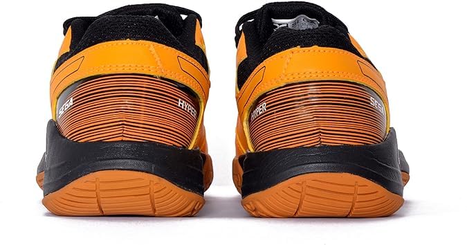 Yellow sports shoe with black accents on a white background, badminton, squash, tennis, table tennis