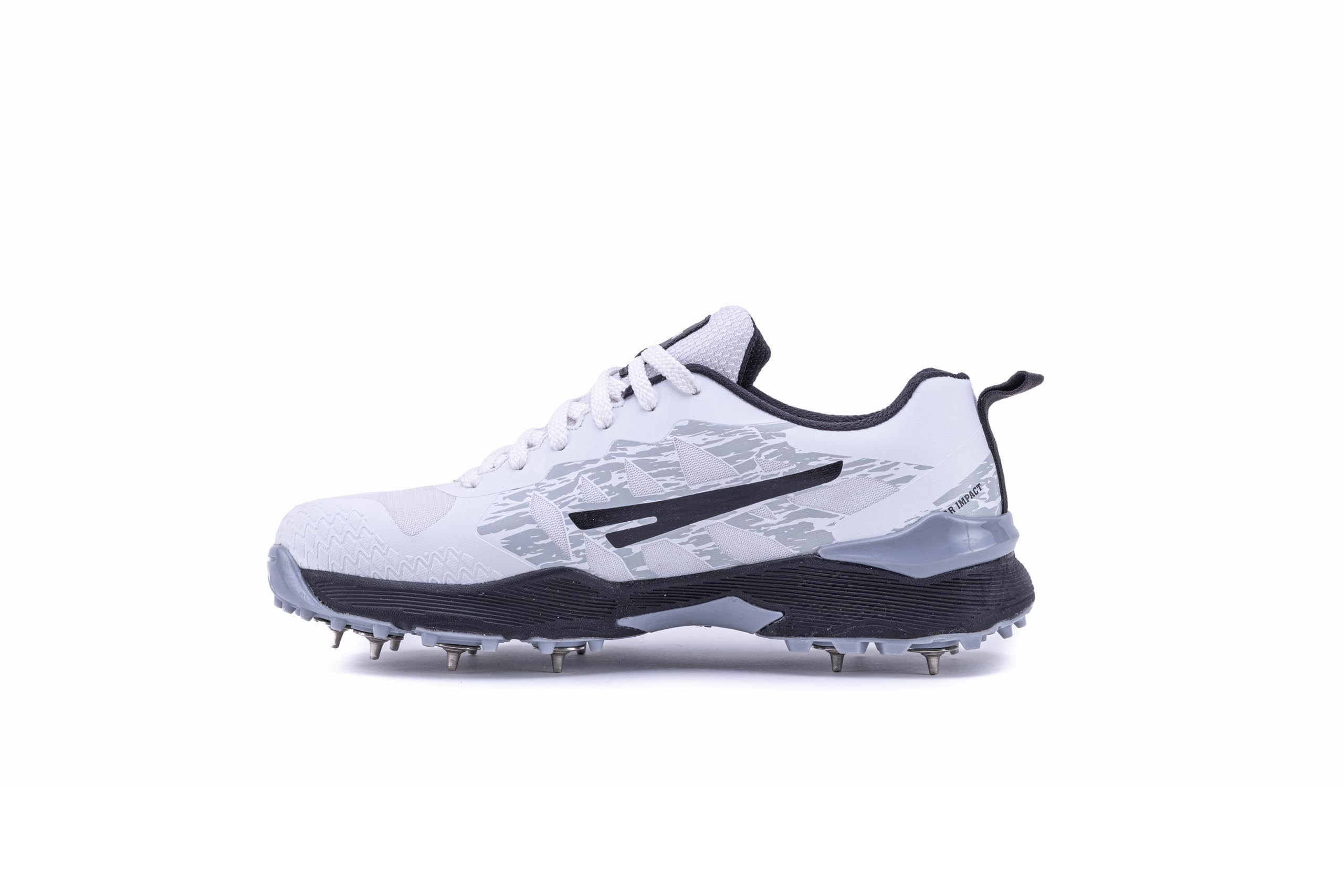A pair of Sega Freedom men's cricket shoes featuring durable metal spikes and a white low-profile design with black accents.