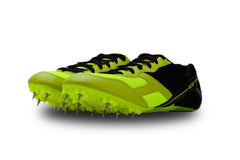 Bright green and black running shoe with cleats on a white background