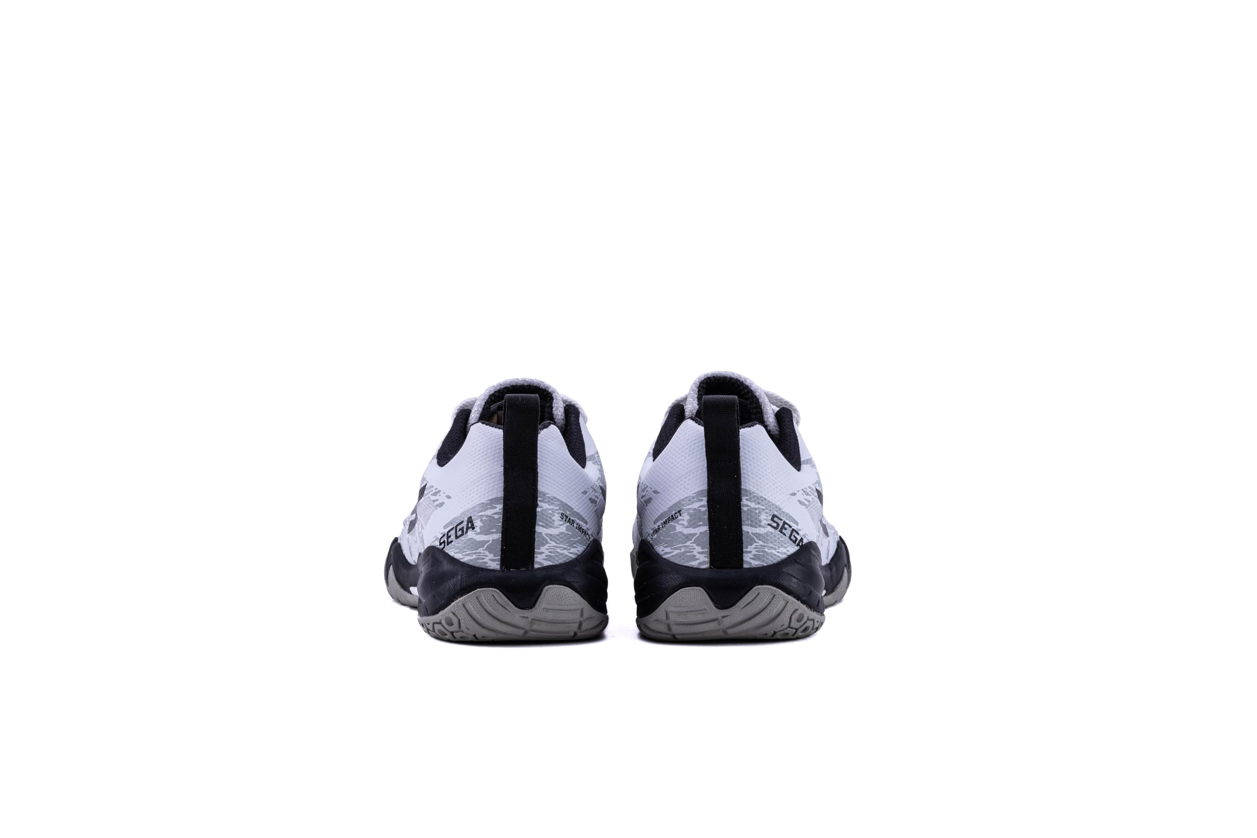 A pair of white QUIVE SEGA RP24 badminton squash court trainers with black accents and a textured sole.