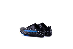 A pair of green and black Sega Aston AR 7 Metal Spikes athletic running spikes with metal spikes on the sole and a blue accent on the side.