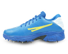 A pair of blue Sega P-25 cricket shoes with yellow accents and metal spikes on the sole.