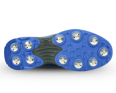 A pair of blue Sega P-25 cricket shoes with yellow accents and metal spikes on the sole.