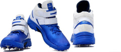 A pair of blue, and white cricket bowling shoes with metal spikes and an external strap for support.