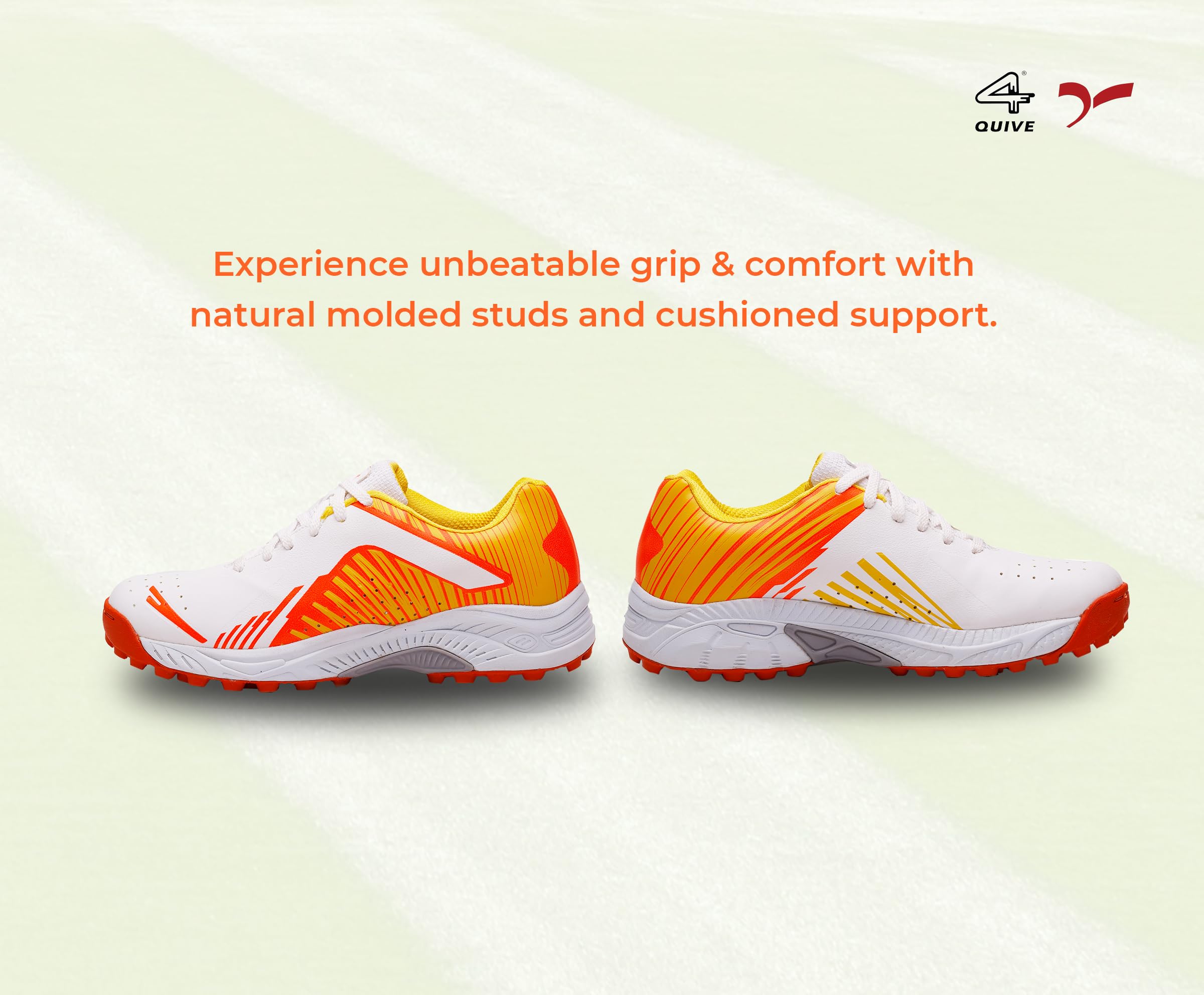 A pair of white, and orange cricket shoes with rubber studs and an lace up for support.