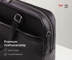 A black premium calf hand made leather laptop bag with a handle and a shoulder strap, featuring a sleek design and multiple compartments.
