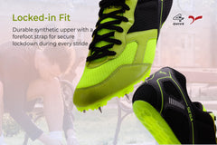 Bright green and black running shoe with cleats on a white background
