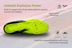 Bright green and black running shoe with cleats on a white background