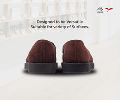 A pair of brown suede leather moccasin loafers for men.