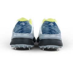 White cricket shoes with blue and black accents on a white background