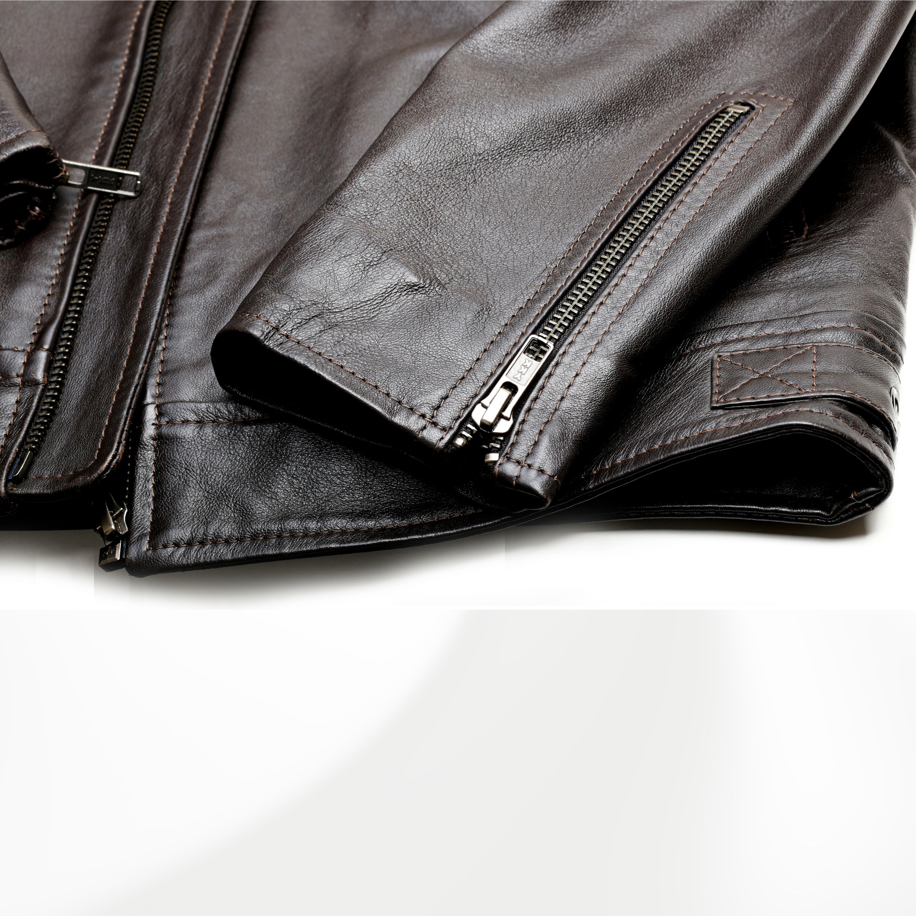 Brown leather jacket a white background