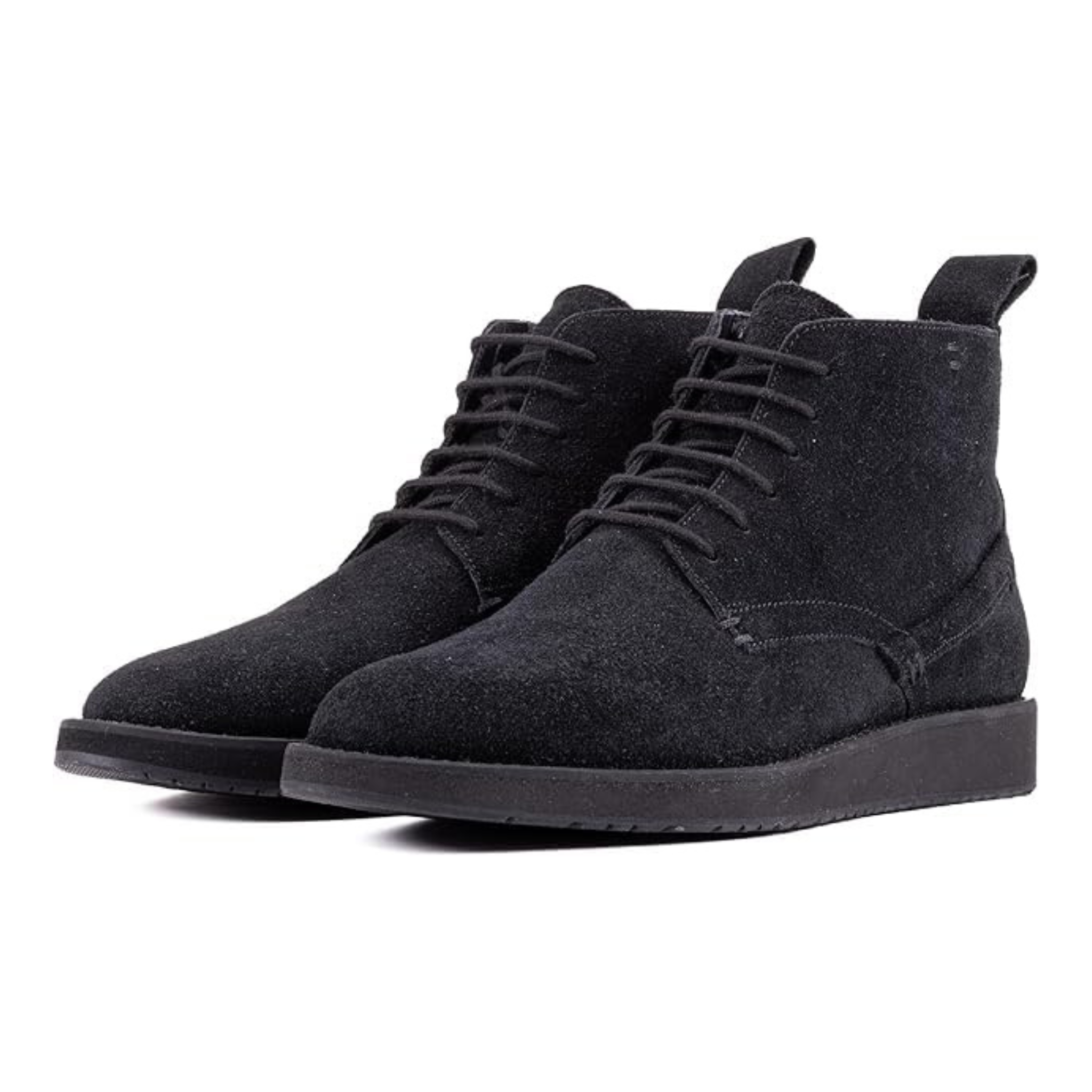 Pair of black suede high-top boots on a white background