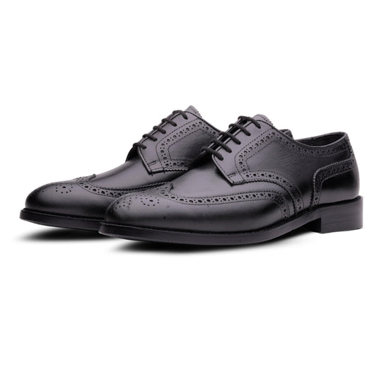 Pair of black leather oxford work and dress shoes on a white background