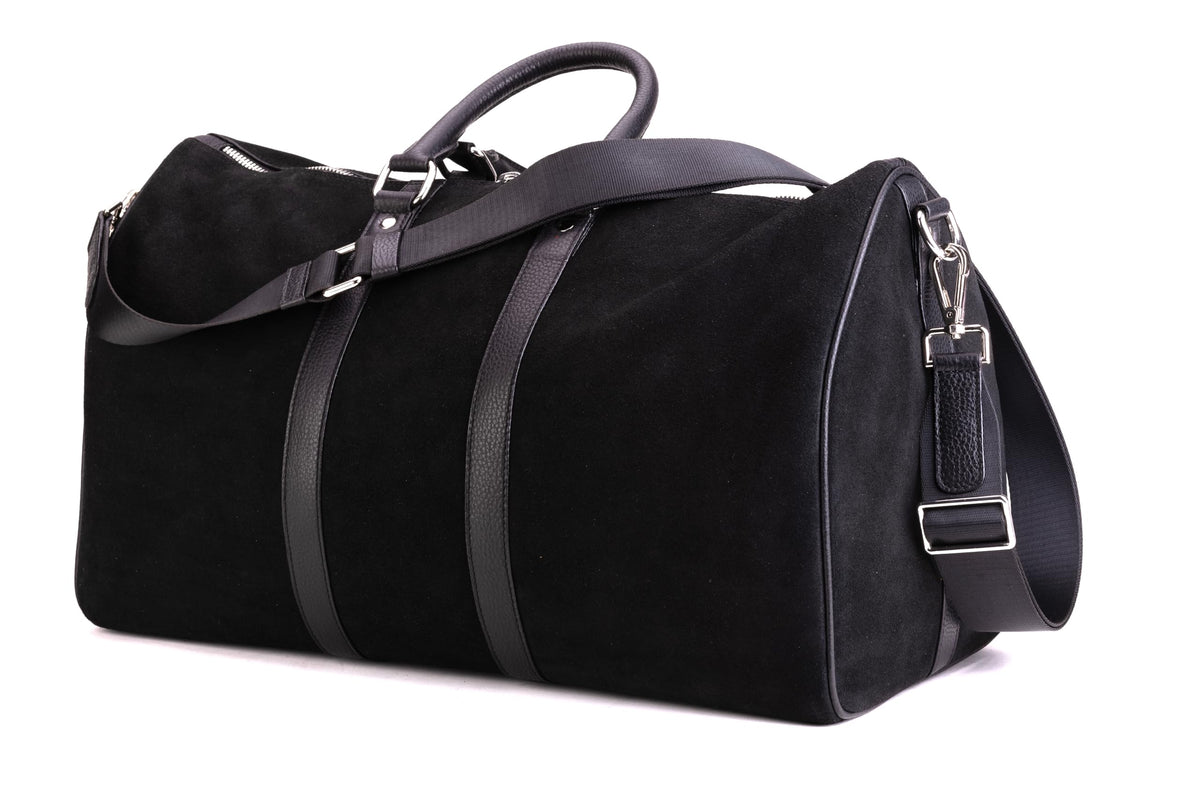 Black QUIVE London Fitzrovia suede weekender bag viewed from above