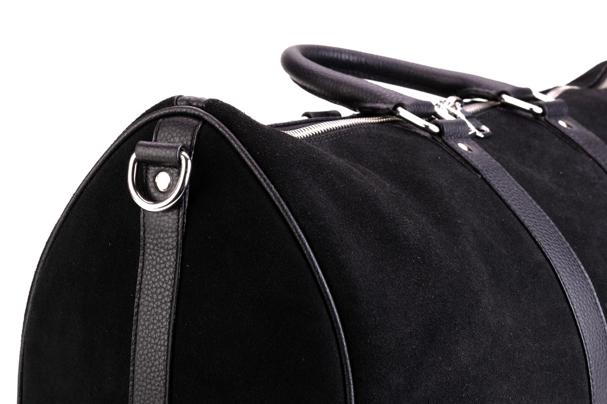 QUIVE London Fitzrovia suede weekender bag, end panel and zipper detail