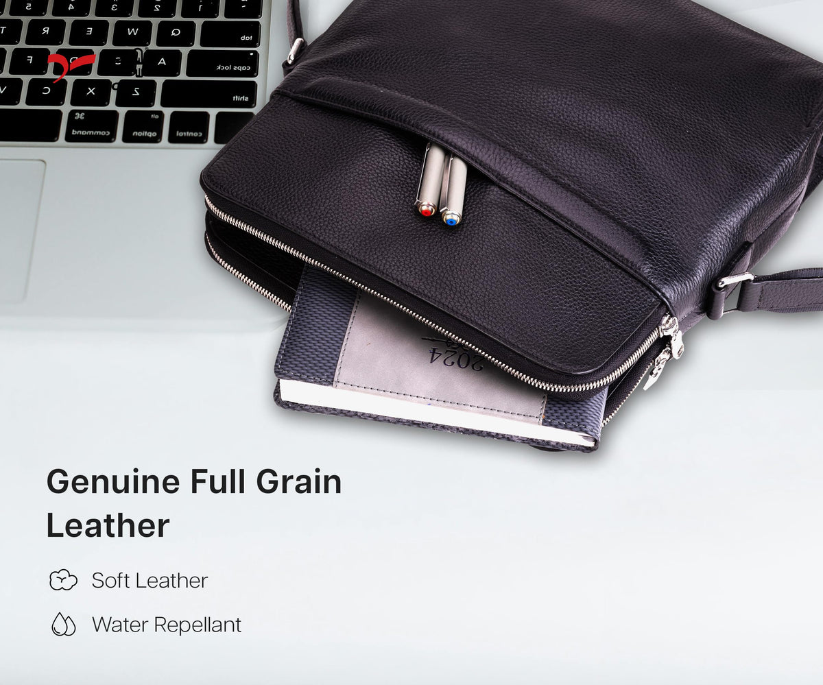 QUIVE London Portman leather crossbody bag open beside a laptop