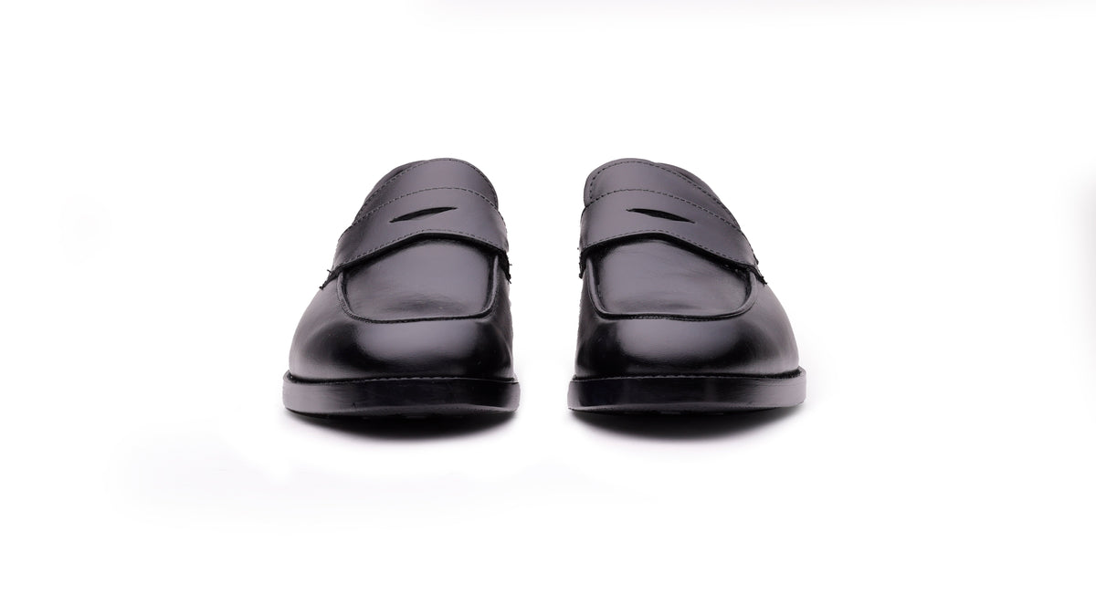 Black QUIVE London Bending leather penny loafers, front view