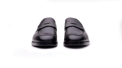 Black QUIVE London Bending leather penny loafers, front view