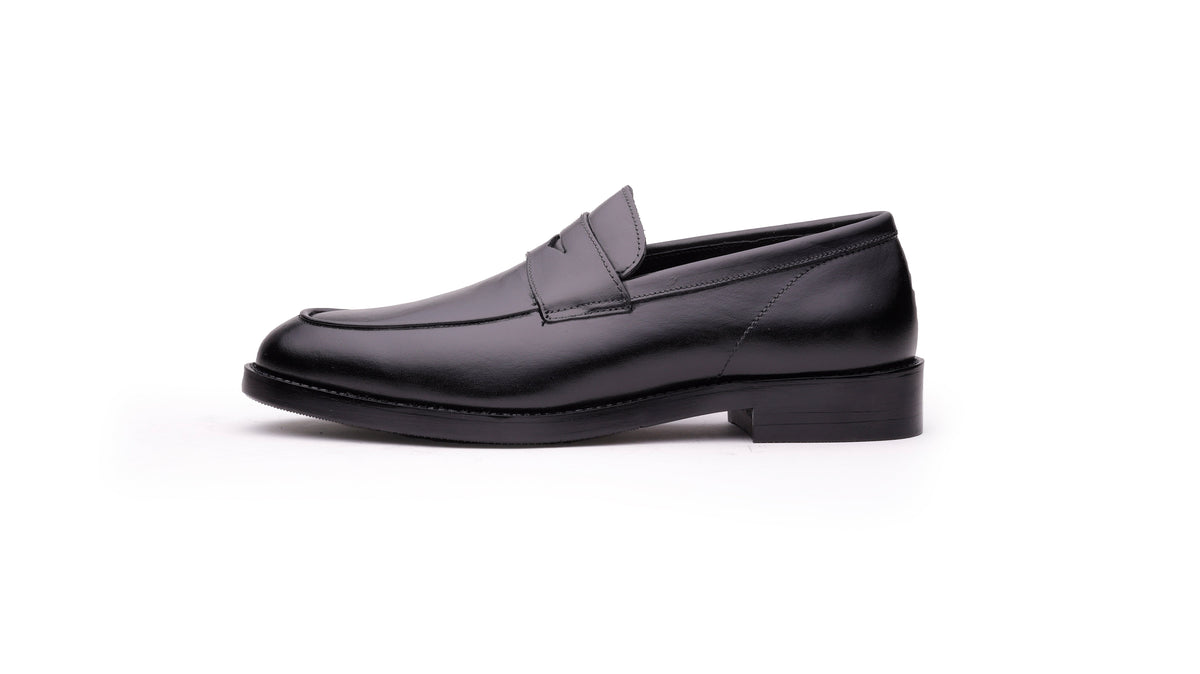 Black QUIVE London Bending leather penny loafer, left-facing side profile