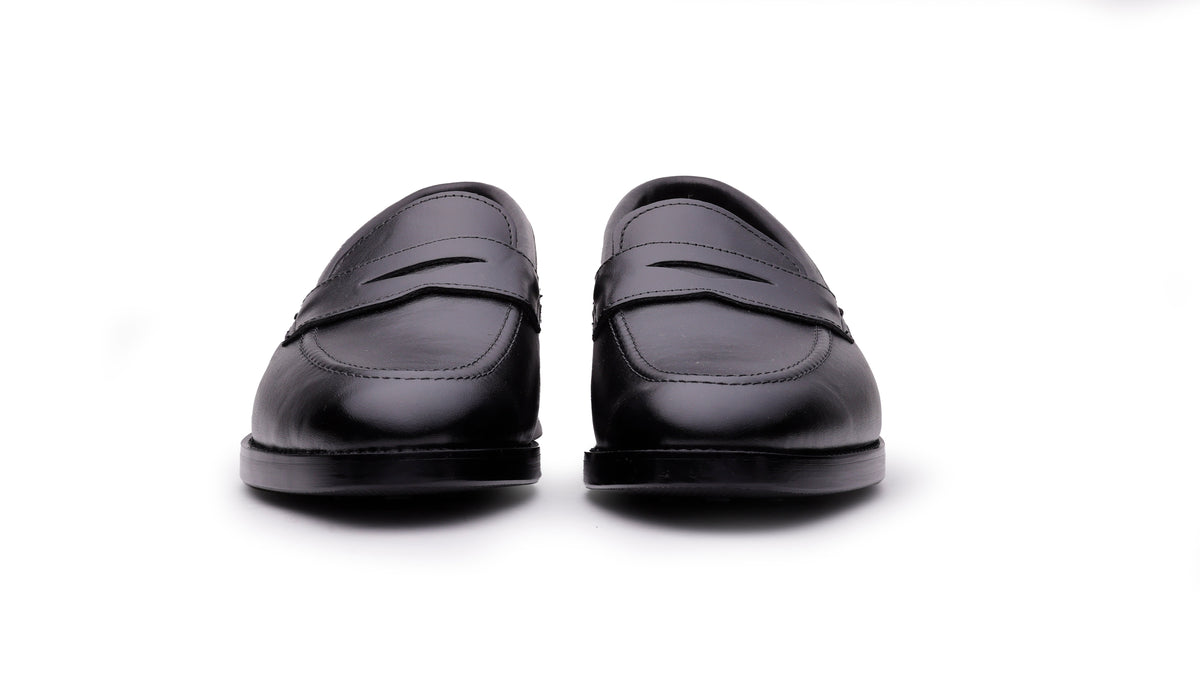 Black QUIVE London Ventor leather penny loafers, front view
