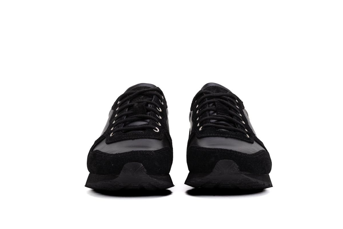 Black QUIVE London Belgravia leather trainers, front view