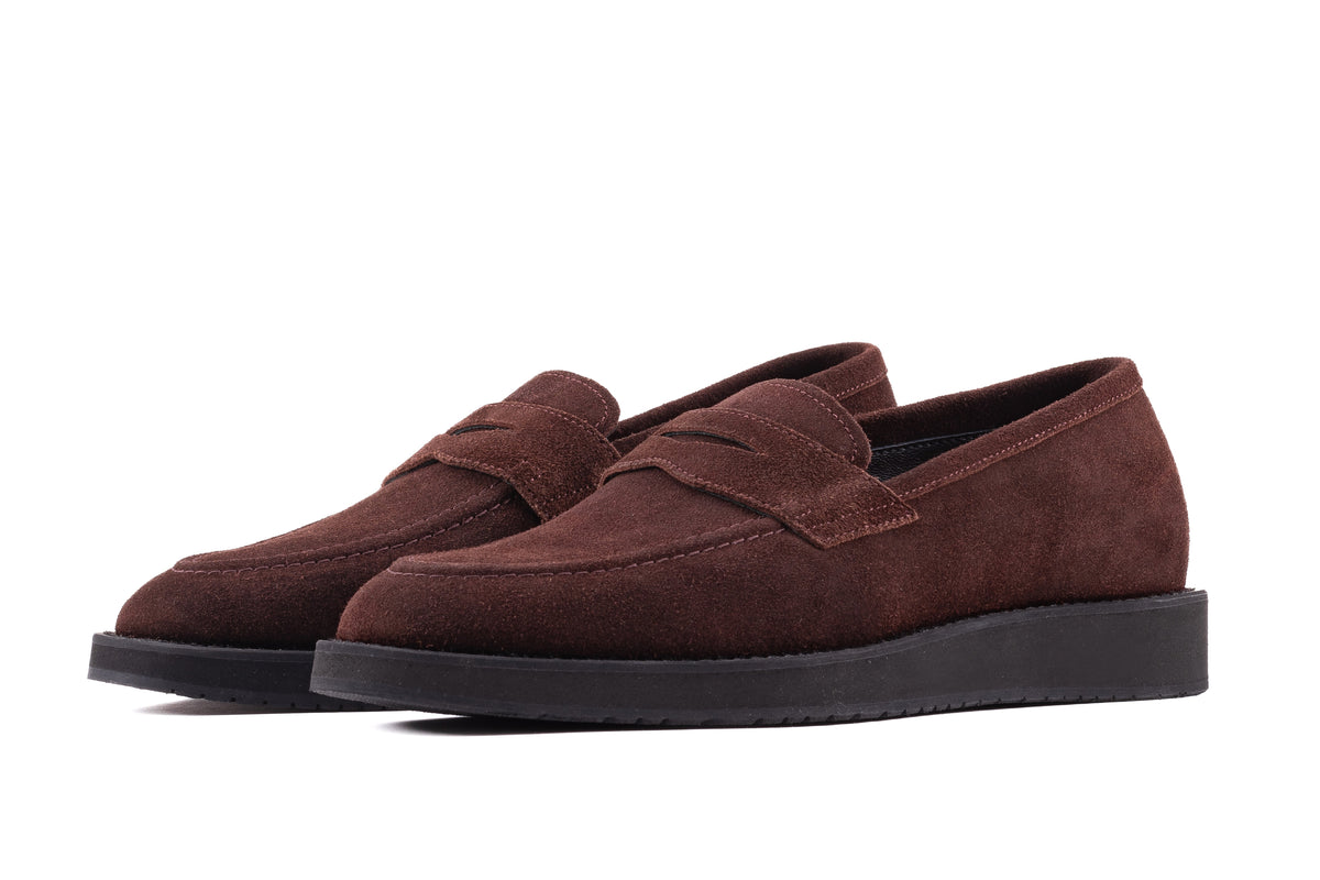 Brown QUIVE London Cambridge suede loafers in a front three-quarter view