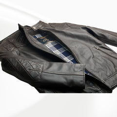Brown leather jacket a white background