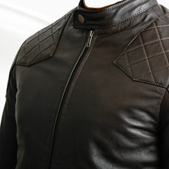 Brown leather jacket a white background