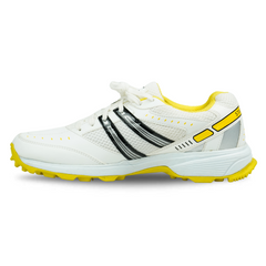 A pair of white cricket shoes with yellow accents and a distinctive design on the sole.