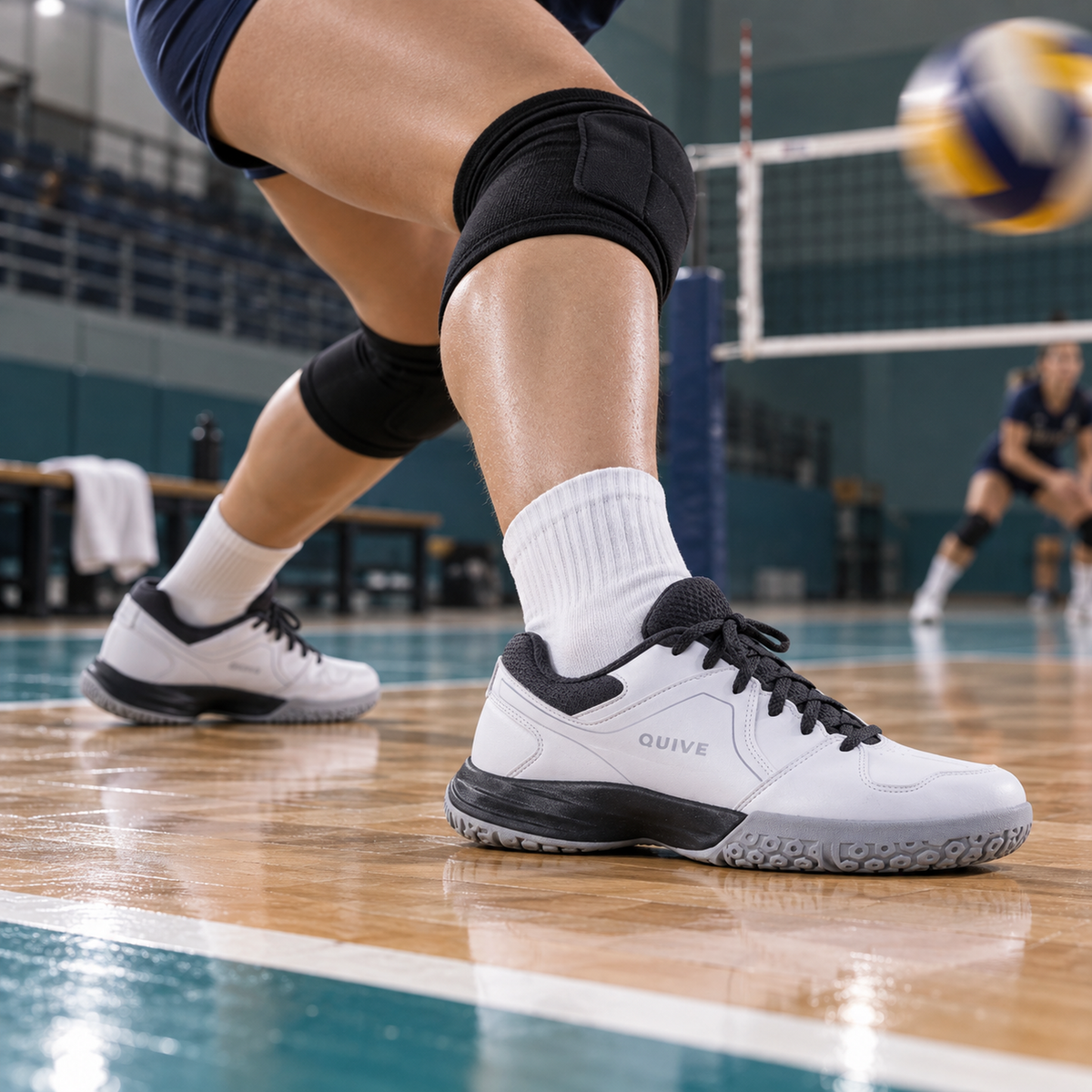 QUIVE Hyper volleyball shoes worn during a defensive court movement drill