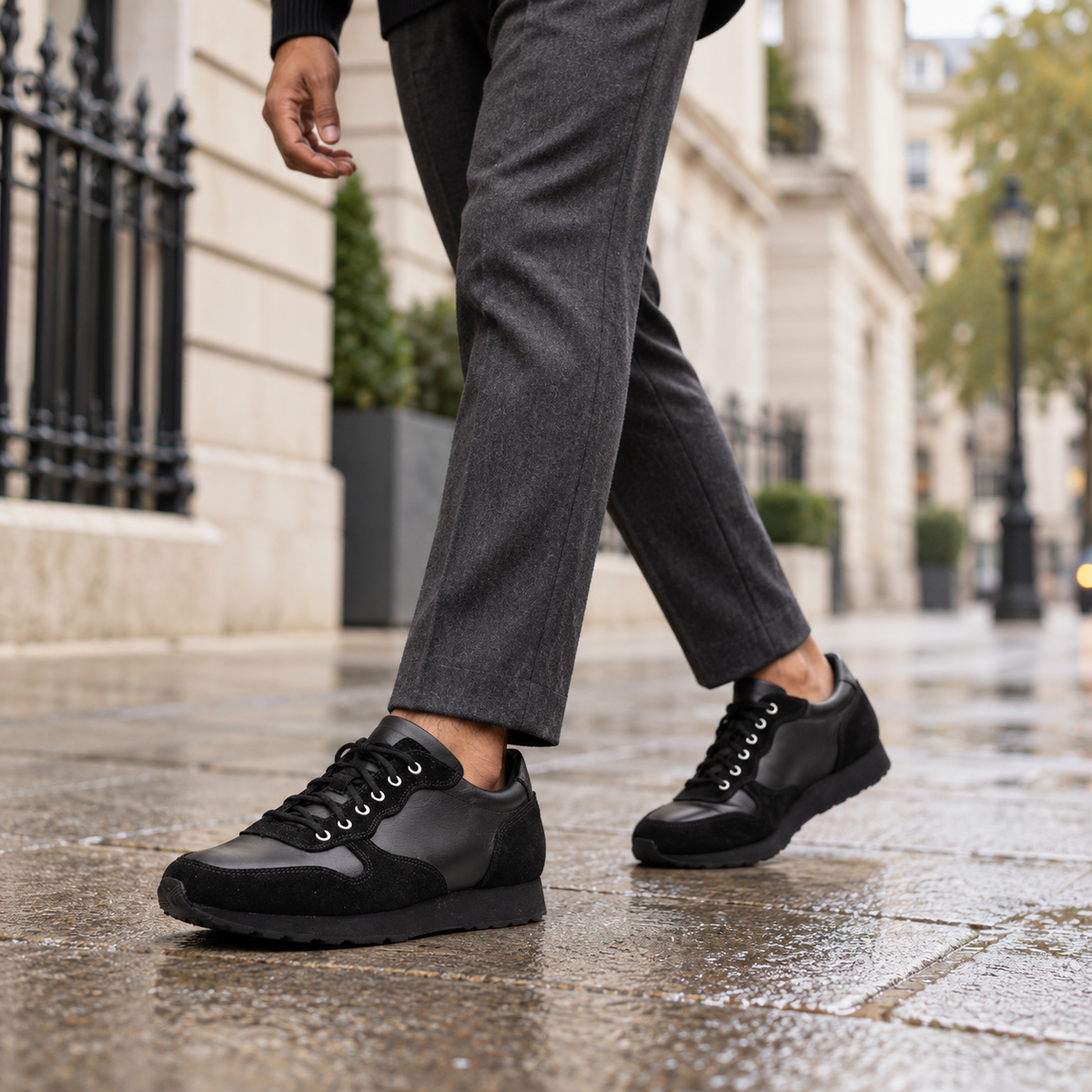 QUIVE London Belgravia leather trainers black in a lifestyle setting