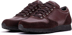 A pair of brown semi-formal lace-up fashion shoes made of premium suede leather, with a rubber sole.