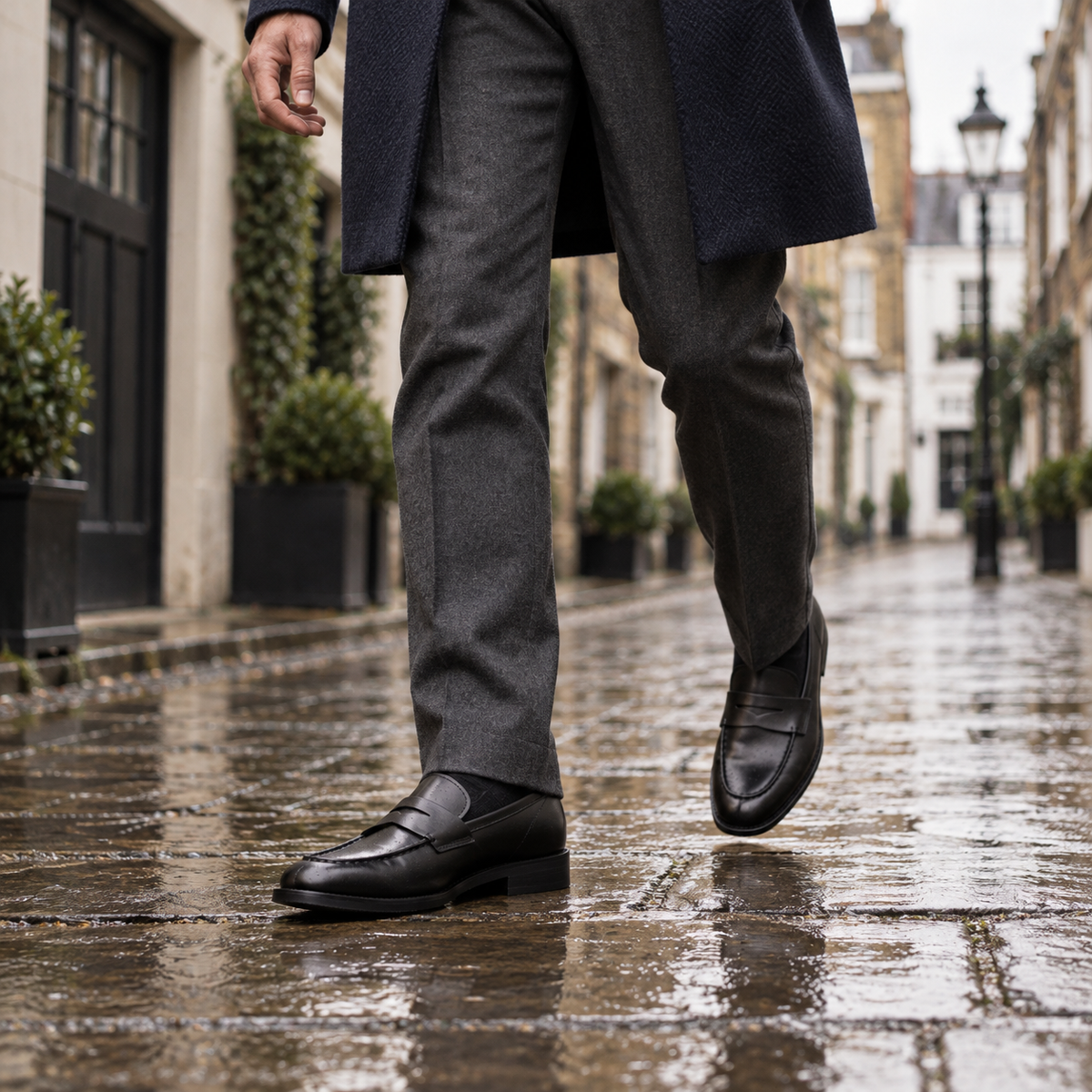 QUIVE London Perth leather penny loafers black in a lifestyle setting