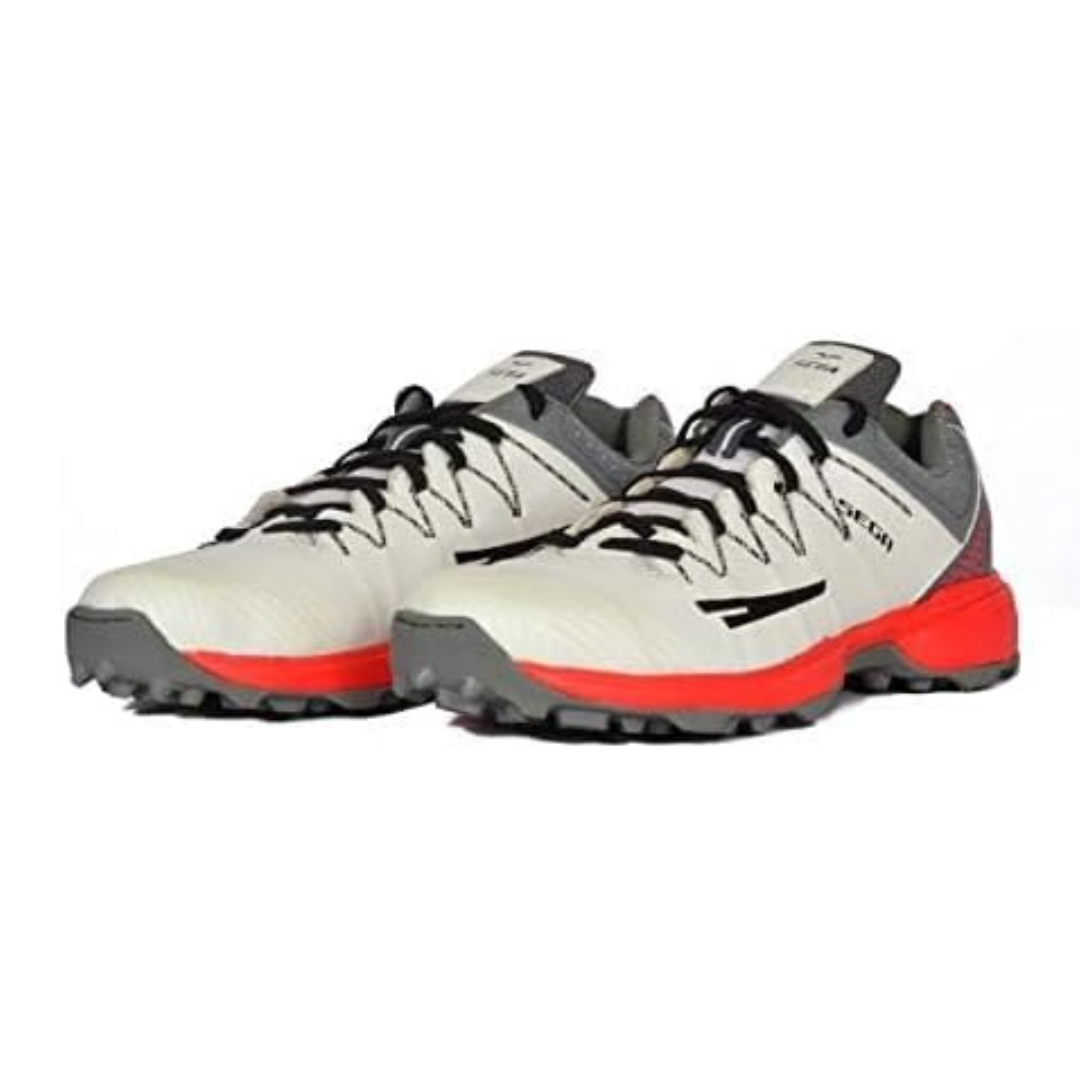 White and gray athletic shoes with red accents on a white background