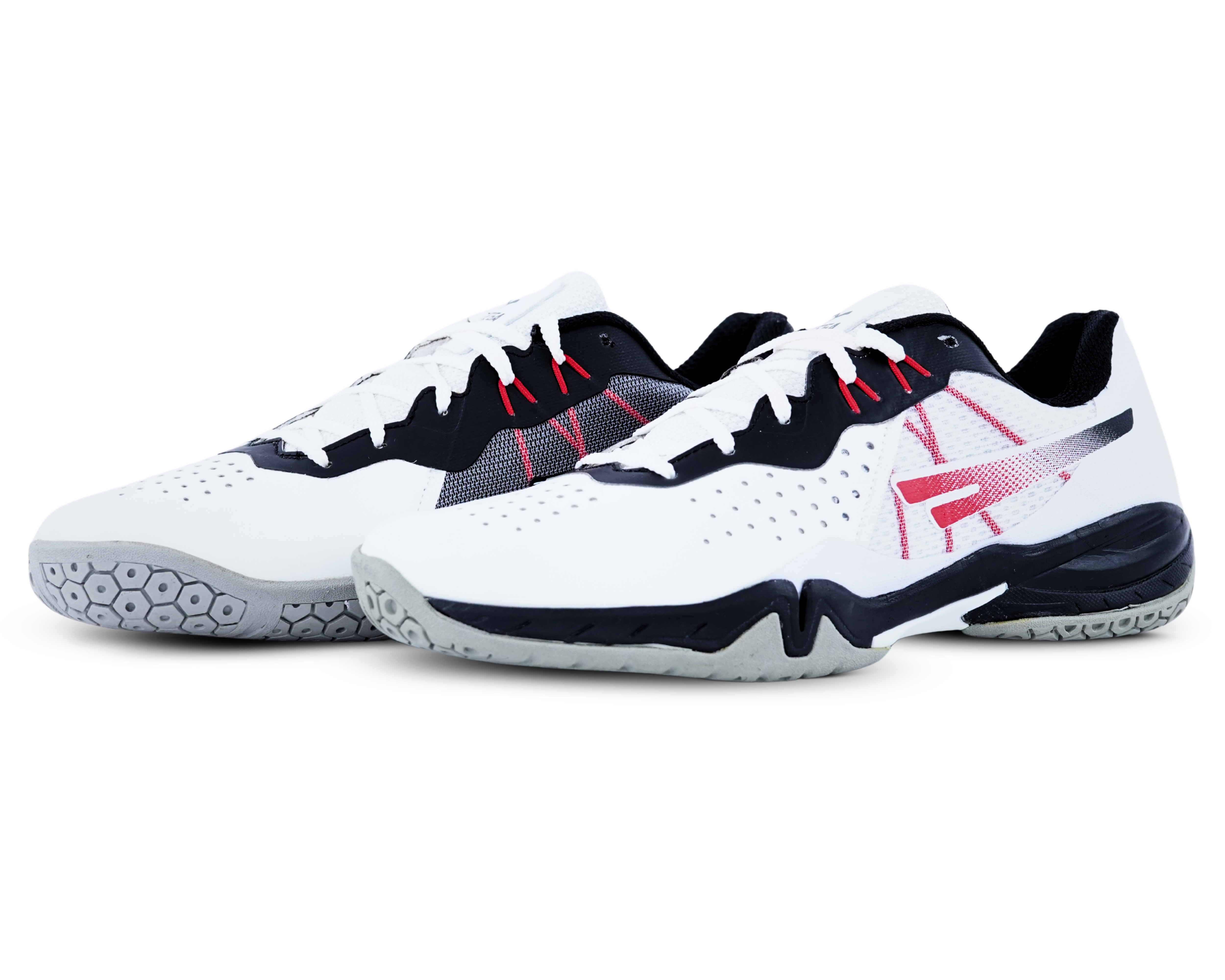 White athletic badminton shoes with black and red accents on a white background